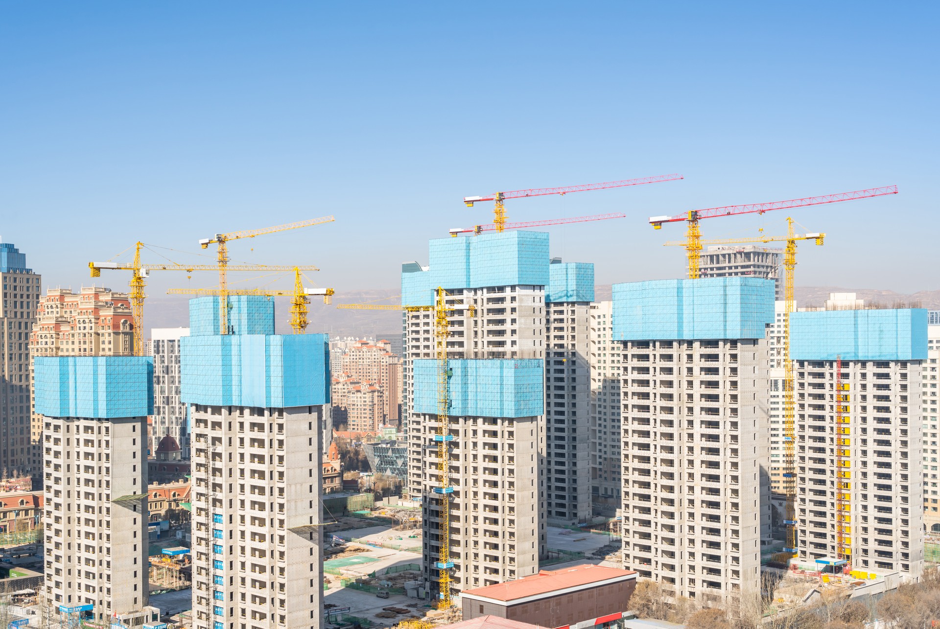 Tall buildings under construction in the city